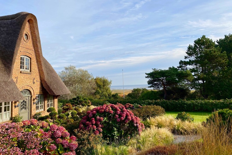 Haus mit Blick auf das Wattenmeer